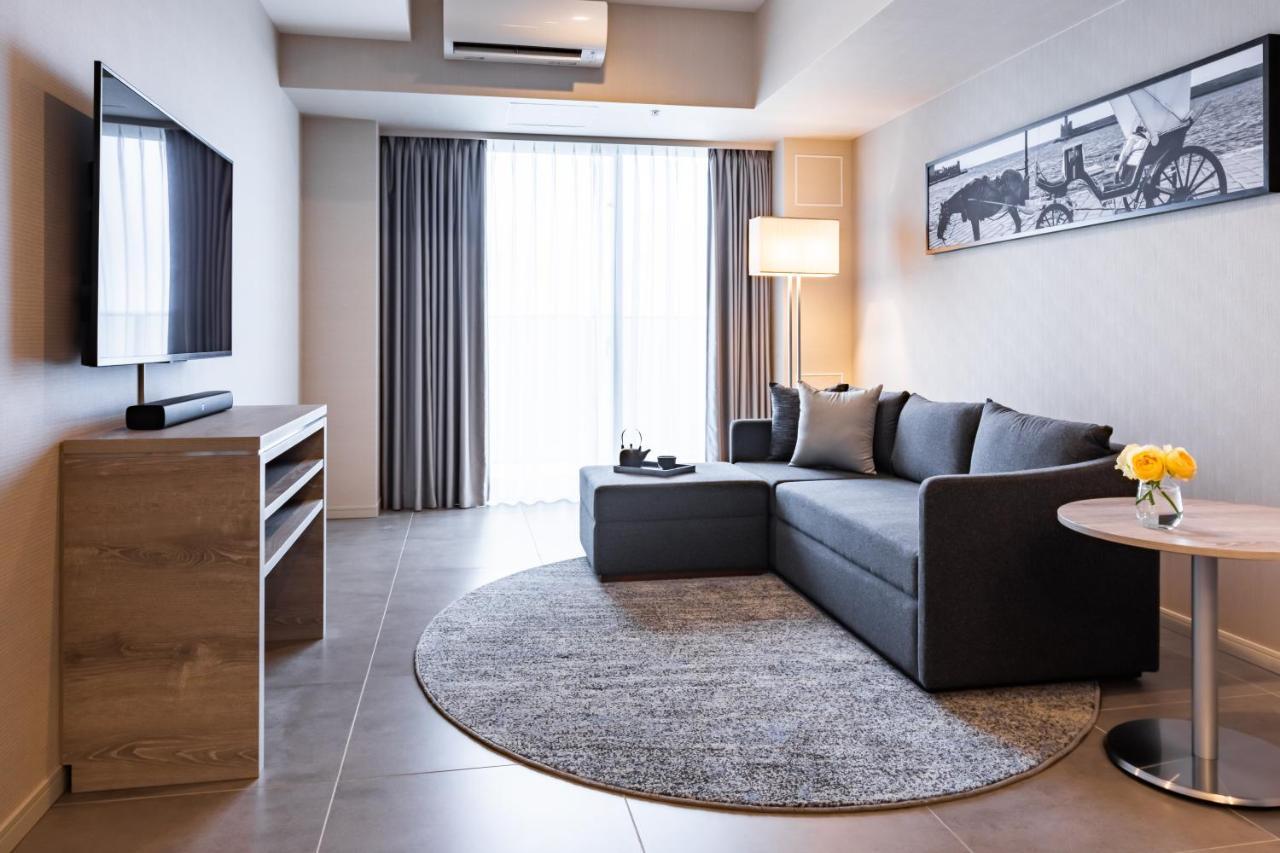 Oakwood Suites Yokohama 横滨 外观 照片 Living room